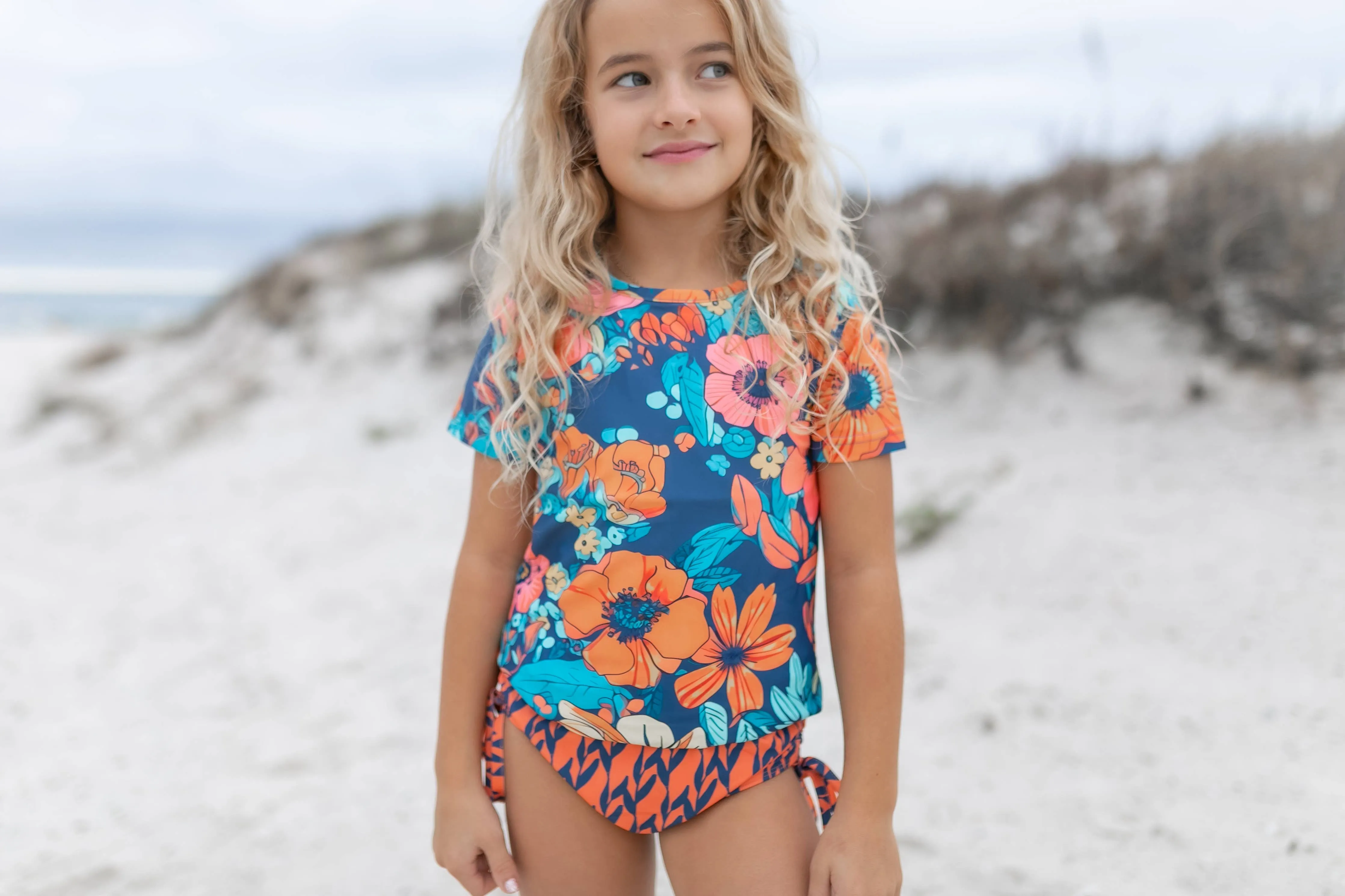Kids Navy & Orange Floral Short Sleeve Rash Guard Swimsuit: