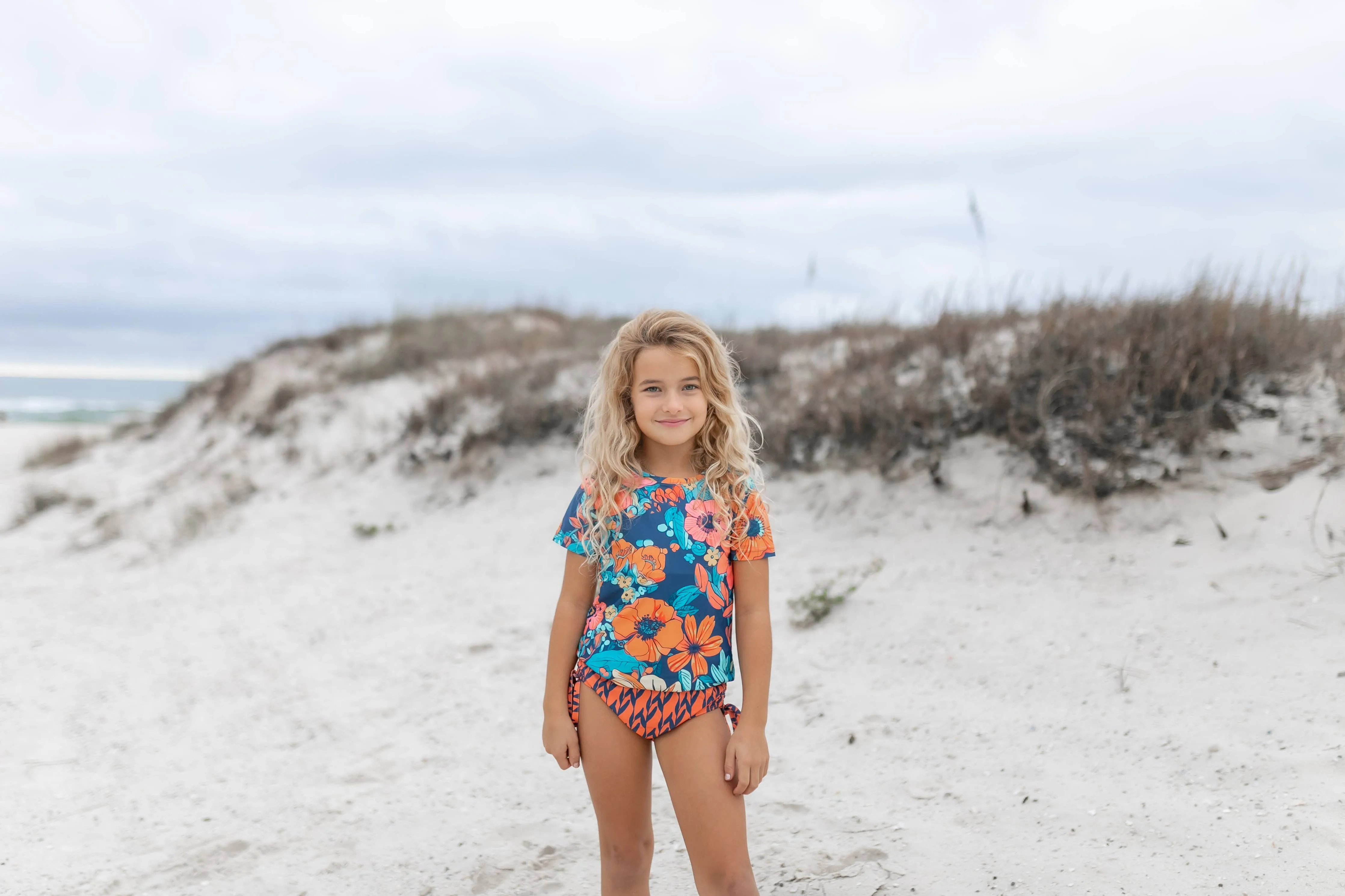 Kids Navy & Orange Floral Short Sleeve Rash Guard Swimsuit: